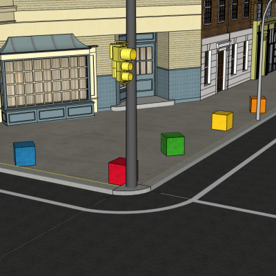 Värvilised betoonkuubikud kaunistavad linnatänavat, lisades elavat ja kunstipärast atmosfääri linnakeskkonnale.