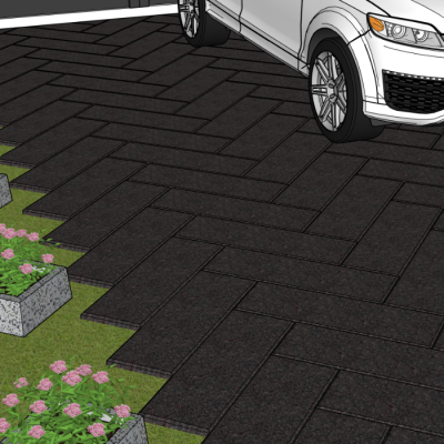 Betoonplaatidest mõõduga 900*300*50mm tehtud sissesõiduteel seisab valge sõiduauto. Plaadid on mustjashalli värvi.